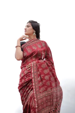 A trsyt with Ajrakh -Jharokha -floral red chanderi ajrakh saree
