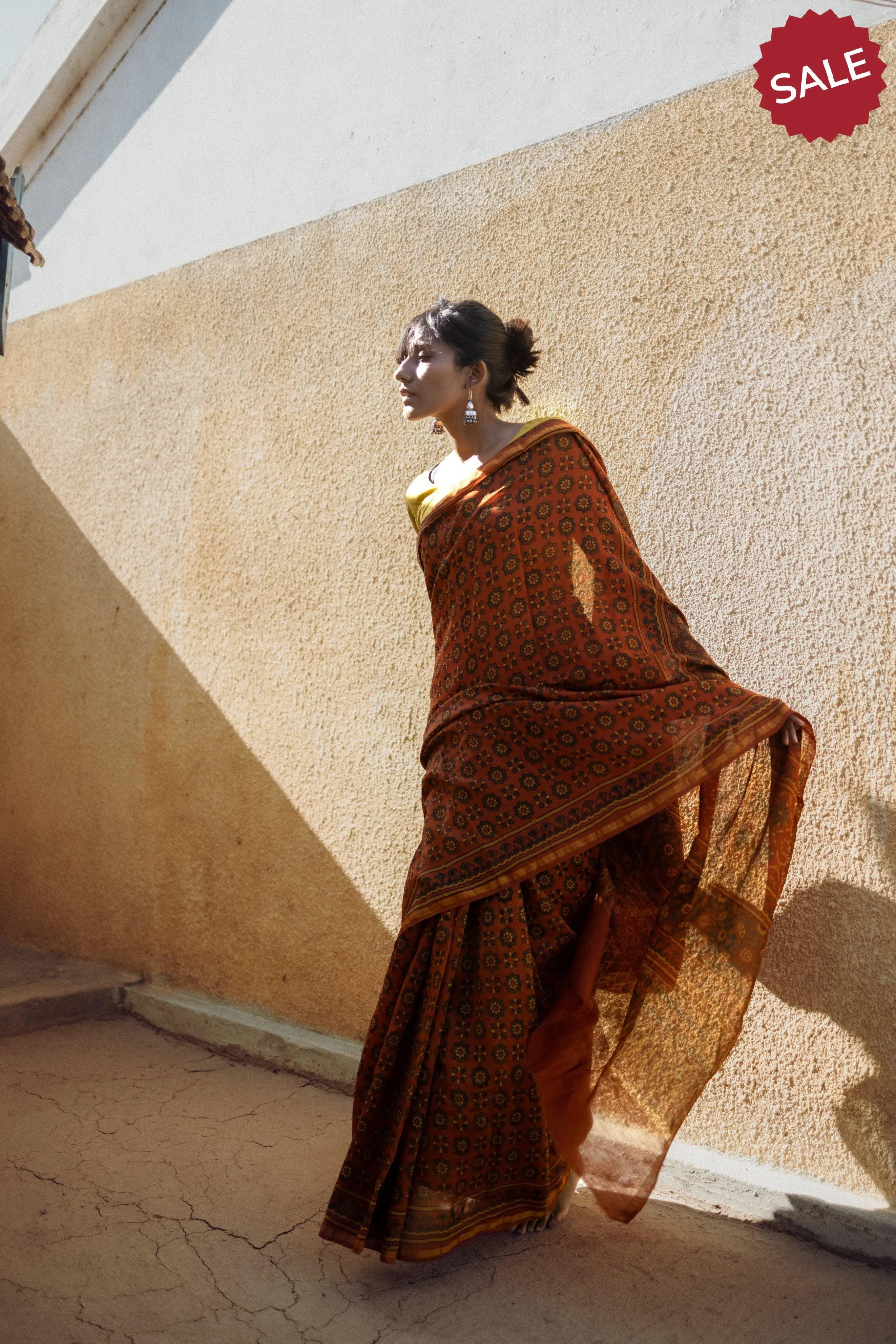 A trsyt with Ajrakh -  Jharokha - Orange green chanderi ajrakh saree