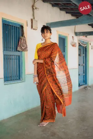 A trsyt with Ajrakh -  Jharokha - Orange green chanderi ajrakh saree
