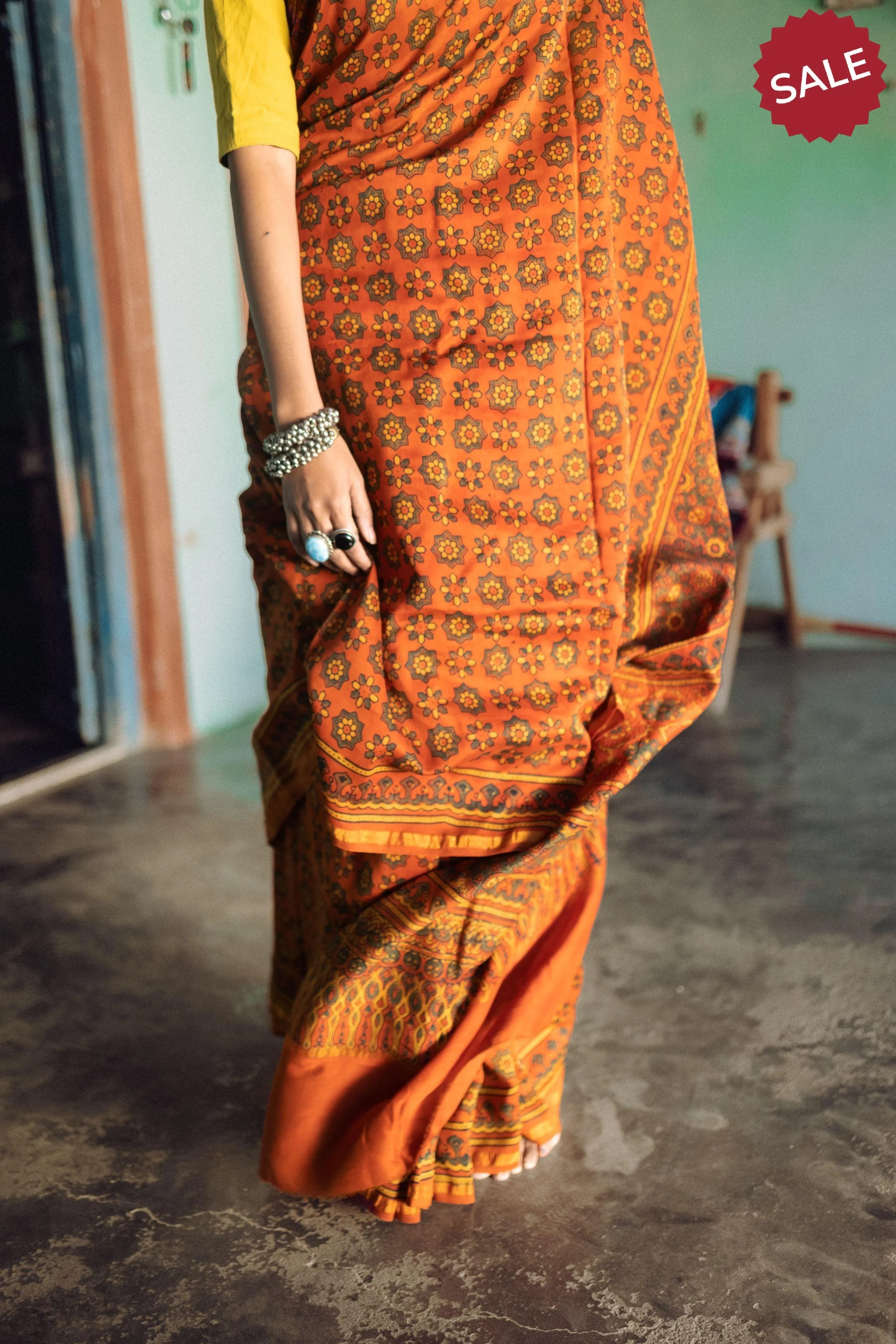 A trsyt with Ajrakh -  Jharokha - Orange green chanderi ajrakh saree
