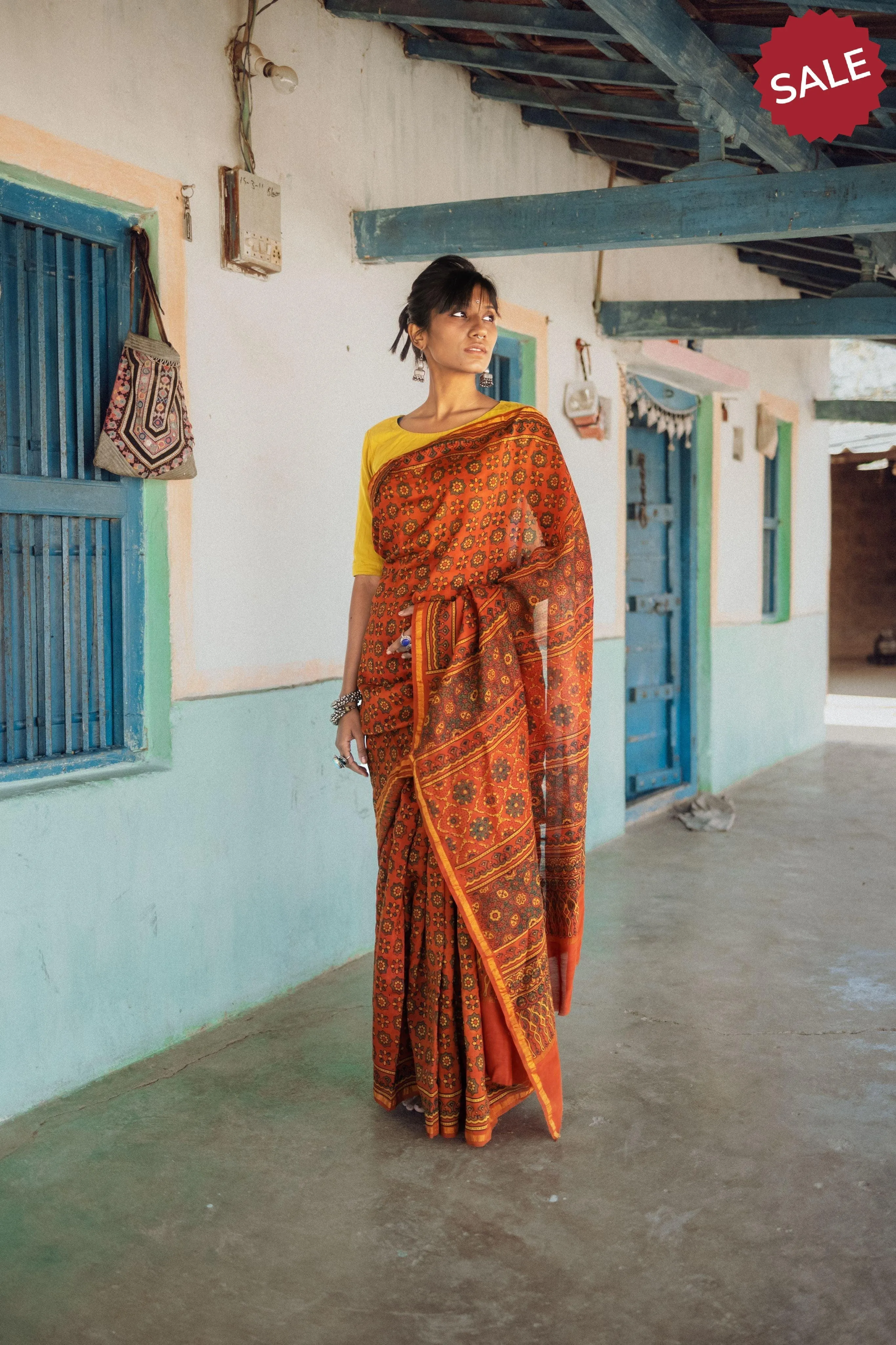A trsyt with Ajrakh -  Jharokha - Orange green chanderi ajrakh saree