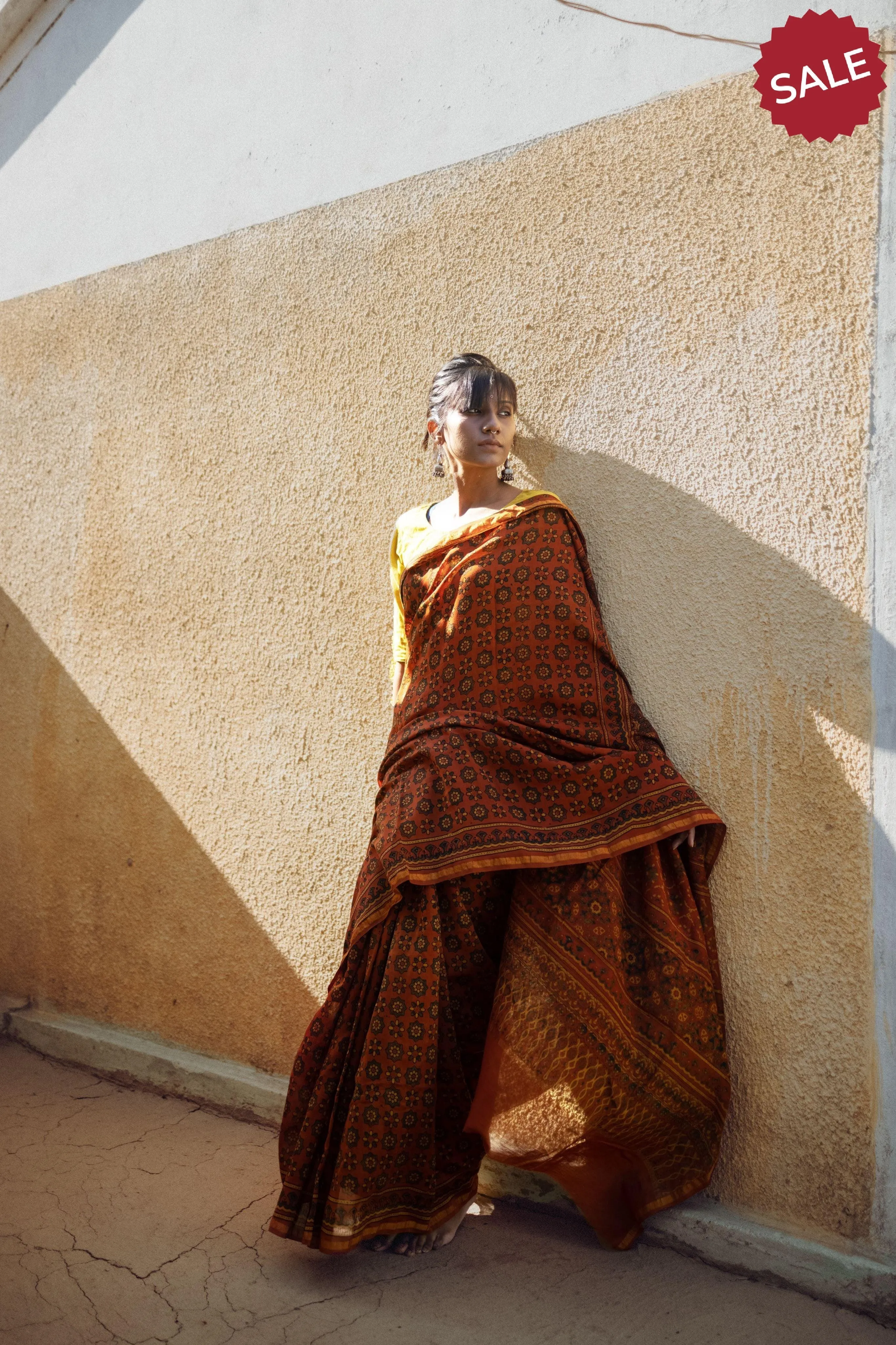 A trsyt with Ajrakh -  Jharokha - Orange green chanderi ajrakh saree