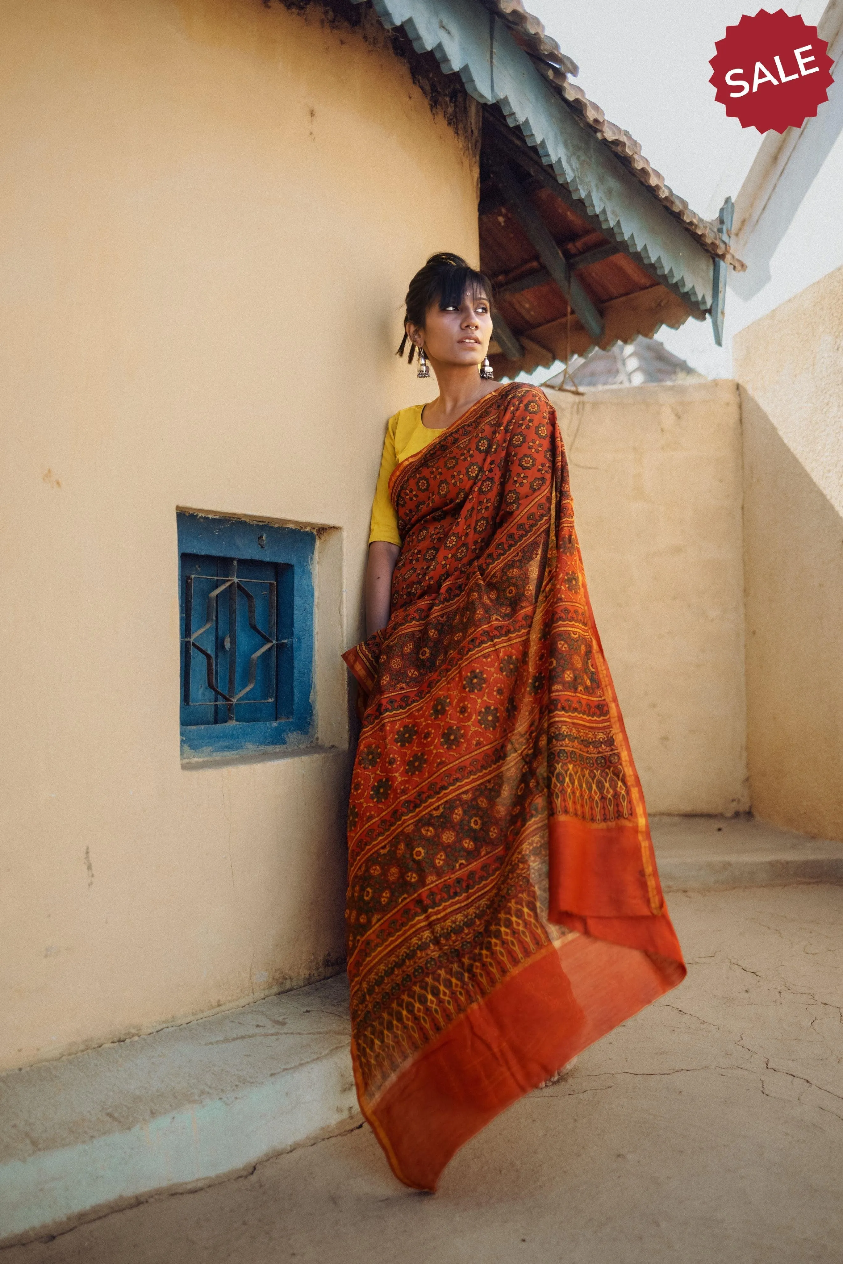 A trsyt with Ajrakh -  Jharokha - Orange green chanderi ajrakh saree