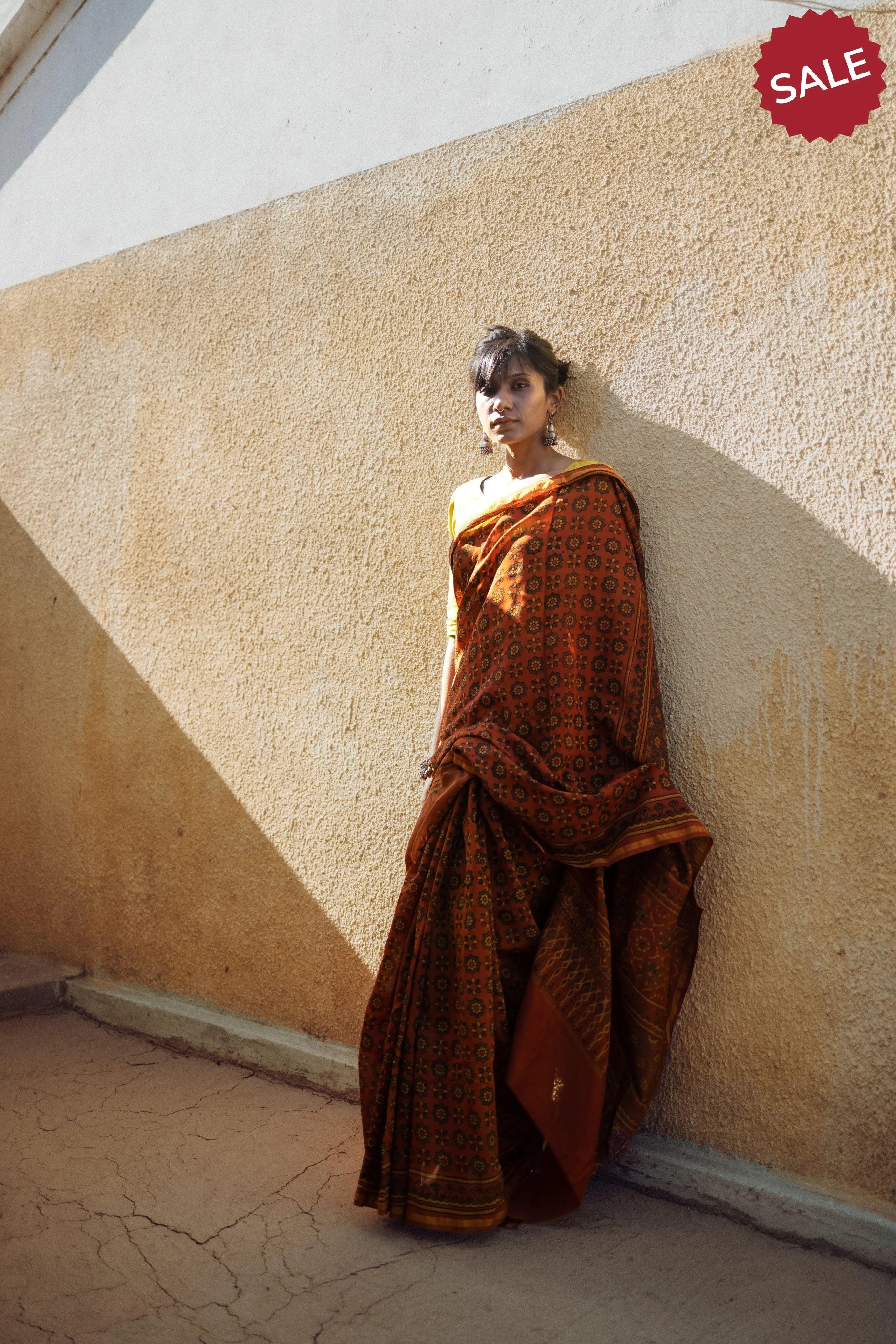 A trsyt with Ajrakh -  Jharokha - Orange green chanderi ajrakh saree
