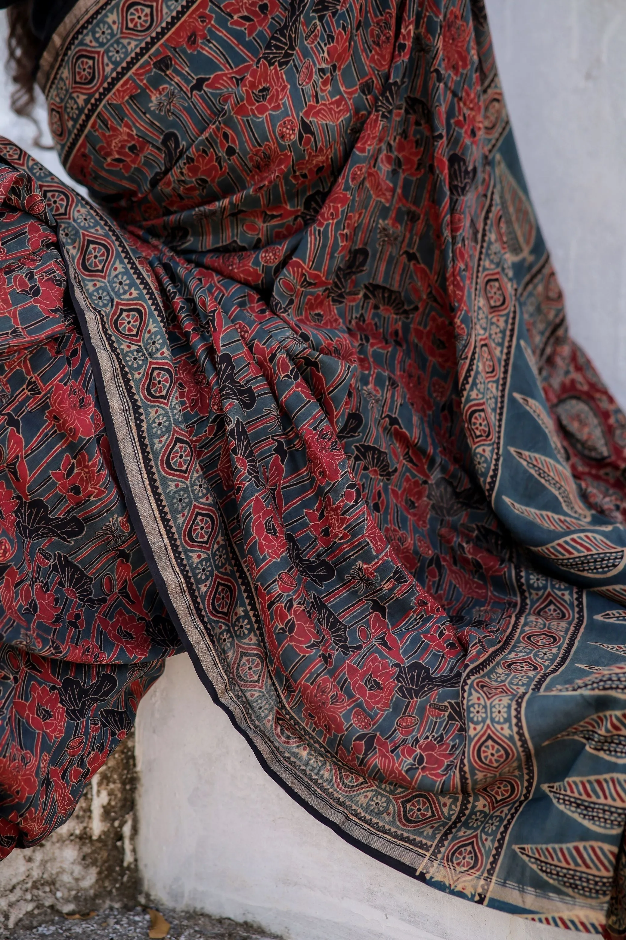 A trsyt with Ajrakh -  Jharokha - red chanderi ajrakh saree